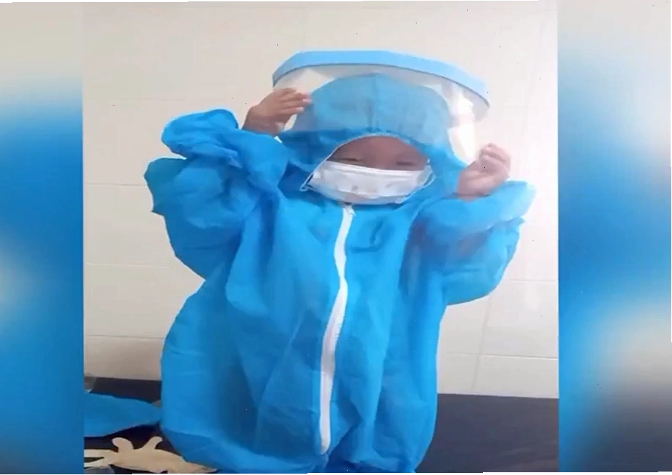 Bé Lò Bảo Huy 3 tuổi cùng bố trở về nhà sau thời gian cách ly y tế
